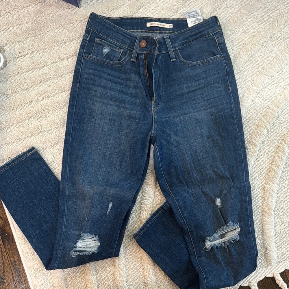 Levi’s 721 high rise skinny Distressed Blue Jeans